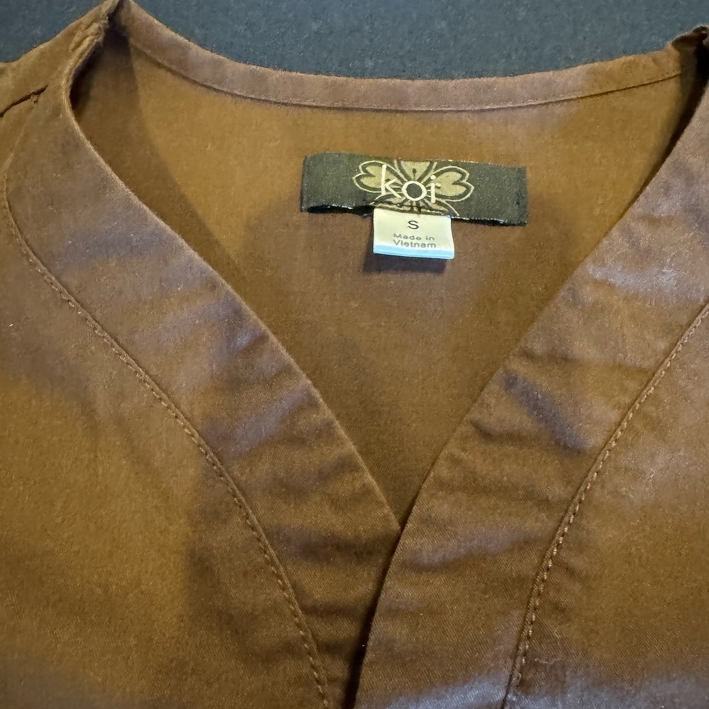 Brown V-Neck Scrub Top by Koi. Women’s sized S